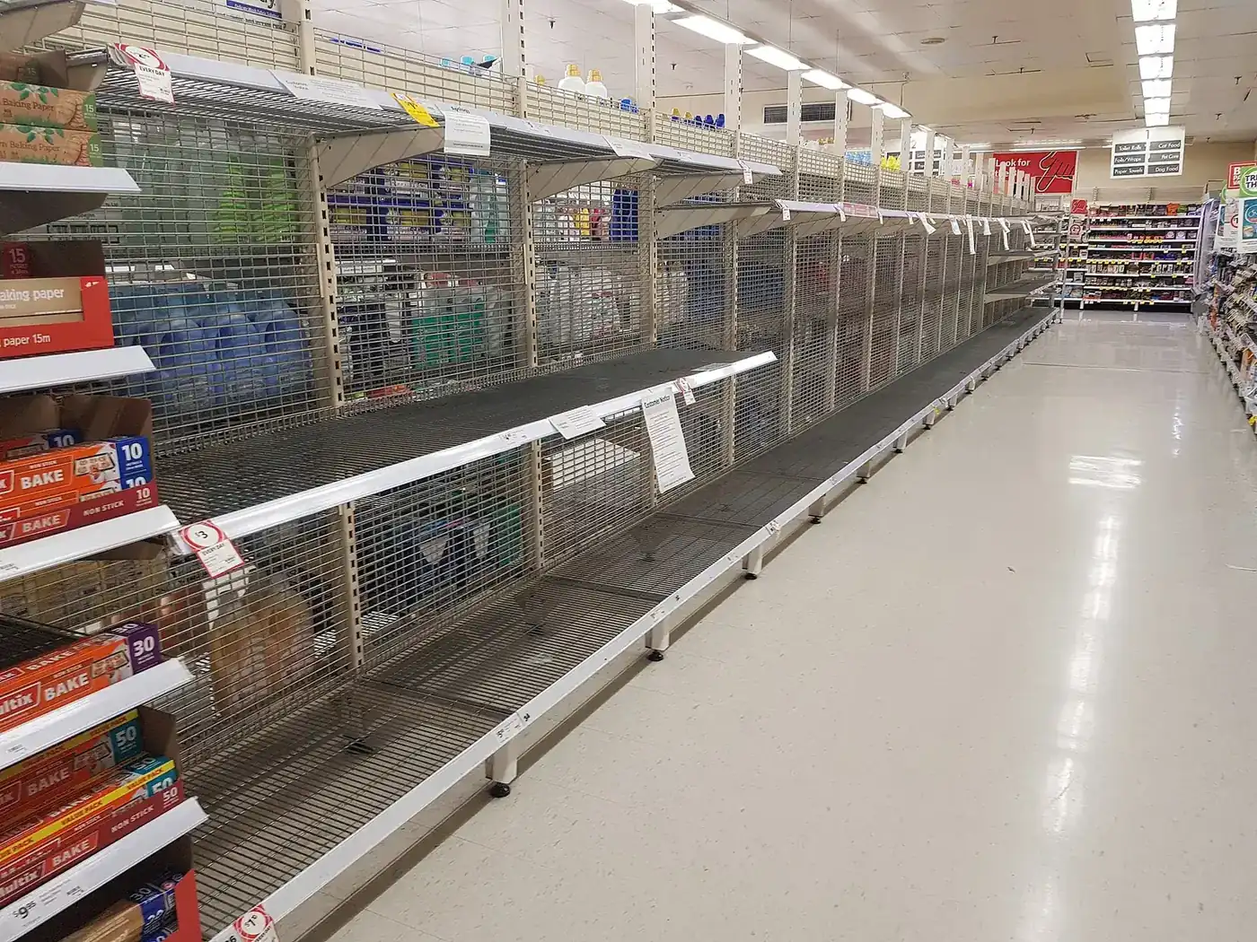 Bare supermarket shelves in Australia on 15 March 2020, with only a few jars left, during the coronavirus pandemic.
